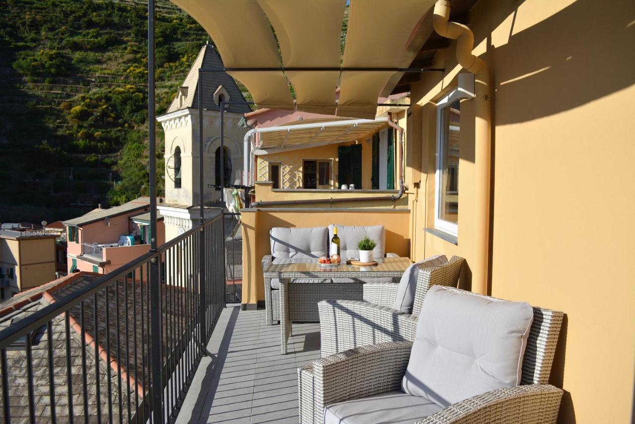 L' Attico Giallo Oro Di Giulia Manarola Luaran gambar